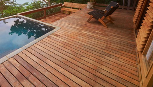 wooden deck with pool